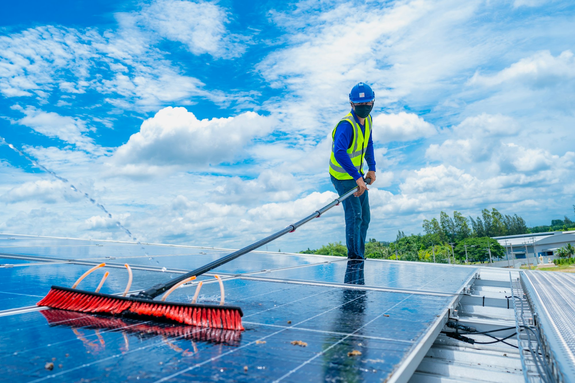 Solar roof cleaning, Professional technicians were washing and the surface of the solar panels